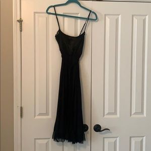 Black strappy dress.